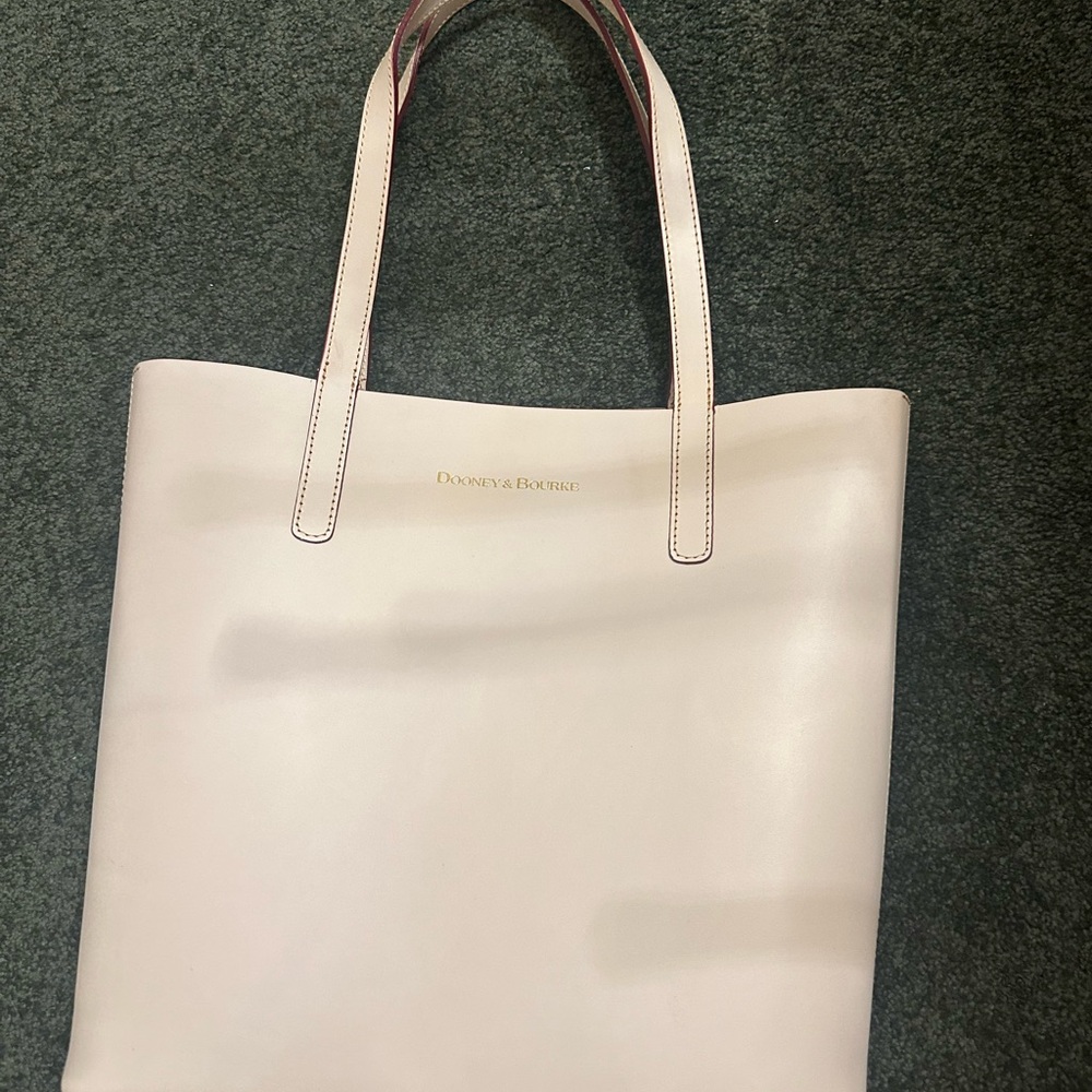 Dooney and Bourke ivory structured tote with small pochette wallet. NWOT.